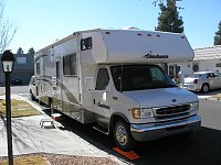 2002 Coachman RV Santara 316KS  Ford V10.   
Best riding and handling, but not enough storage space.