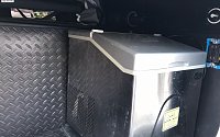 Added a plug in the storage compartment for our ice machine, and padding under all lower storage areas to keep items from shifting around during travel. Also eliminated road noise from below.