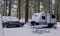 A killer week at Mammoth with a 2 foot powder dump. The site pipes froze up along with my hoses and filter but the trailer plumbing and tanks worked great. I made a point of using the furnace instead...