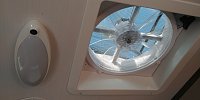 MaxxAir fans in the bath and above the bed.  This one above the bed is wired over to the light.  Easy install.