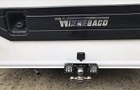 Rigid back up lights activated when in reverse. Also relocated rear generator exhaust to center to keep It from scraping when RV rocks leaving a driveway.