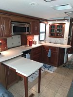 05 Adventurer 35A:  Biggest kitchen I've ever seen in a motorhome with tons of countertop space.  Opposing slides in the living/dining areas is amazing.