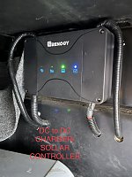 DC to DC Charger and Solar controller. Lithium batteries when deeply discharged have a higher absorption rate that can damage the alternator. This device replaces the isolator. 
When solar charging...