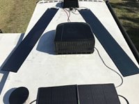 2x 100w CIGS panels (non-permanent mount) wired in serial to roof gland, and 110w soft portable panel w/30ft cable wired to SAE sidewall port