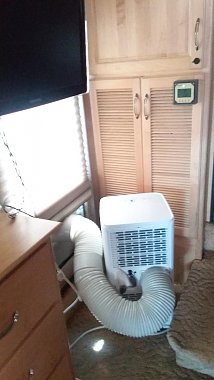 Click image for larger version

Name:	2 Portable AC In Bedroom - Turned Towards Basement AC Air Duct (47.3F).jpg
Views:	55
Size:	68.7 KB
ID:	179269