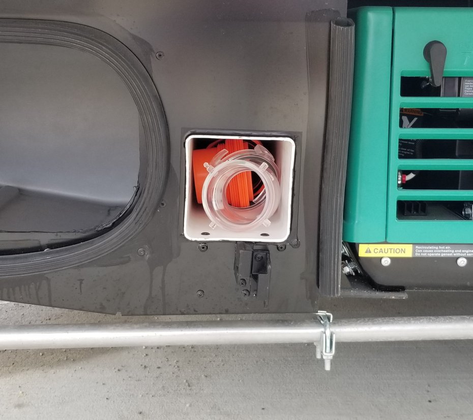 Mod Sewer Hose Storage.  Copied idea from YouTube video posted by Doug Kleven.  Pretty smart guy.
20' of Rhino hose with all attachments fits in here.
Has a black rubber top that keeps everything in place.