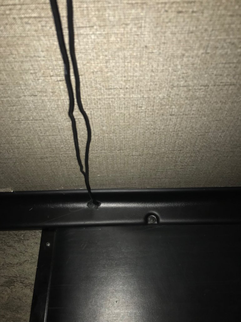 Wire route from floor to arm rest