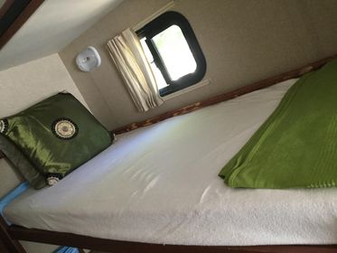 31H upper bunk.  With just two of us in the RV, we don't need this bunk, but it's a great storage area since there is almost no counter space.